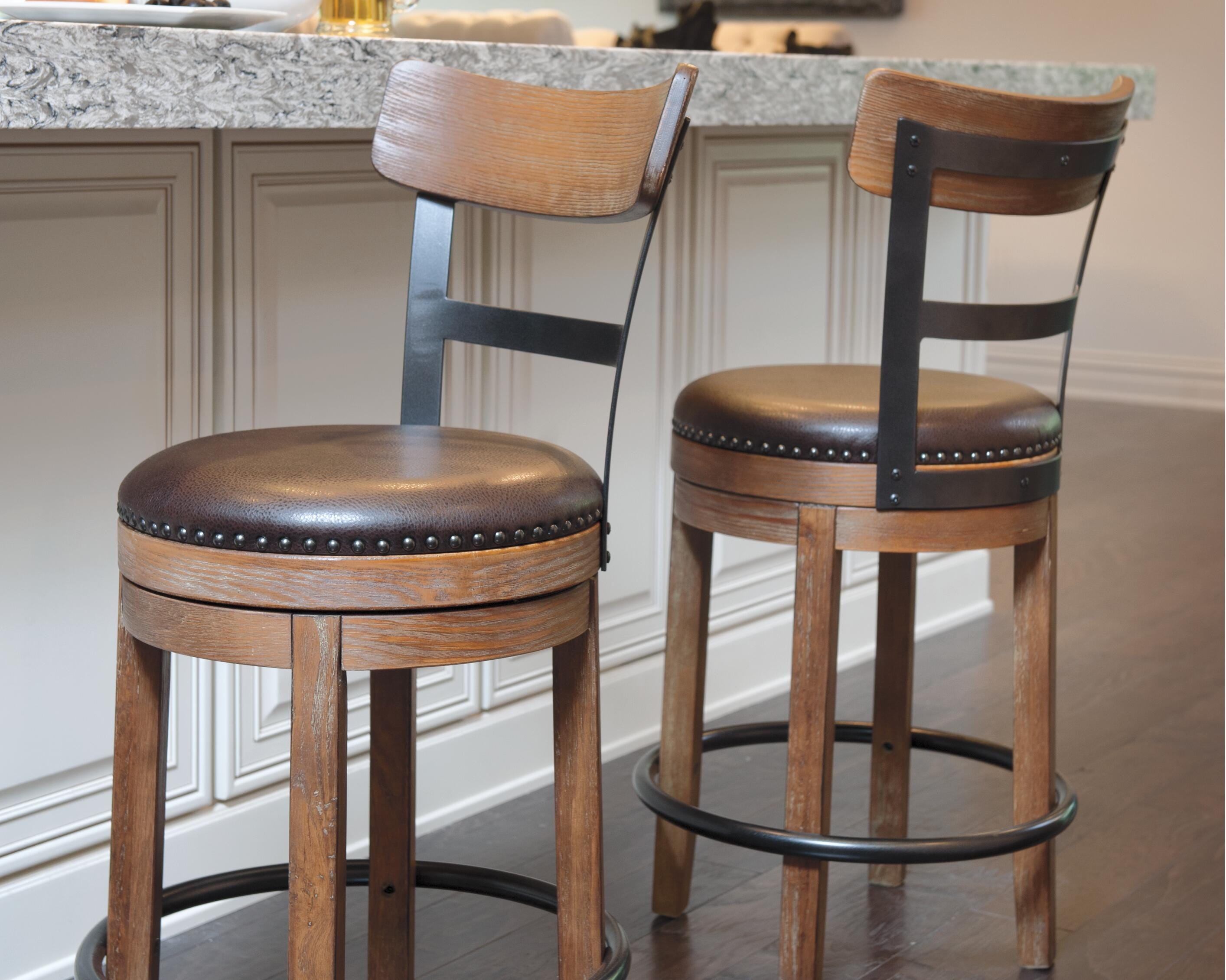 Dar Furniture - Ashley Furniture - Pinnadel Counter Height Bar Stool - UPH Swivel Barstool (1/CN) / Light Brown - D542-124
