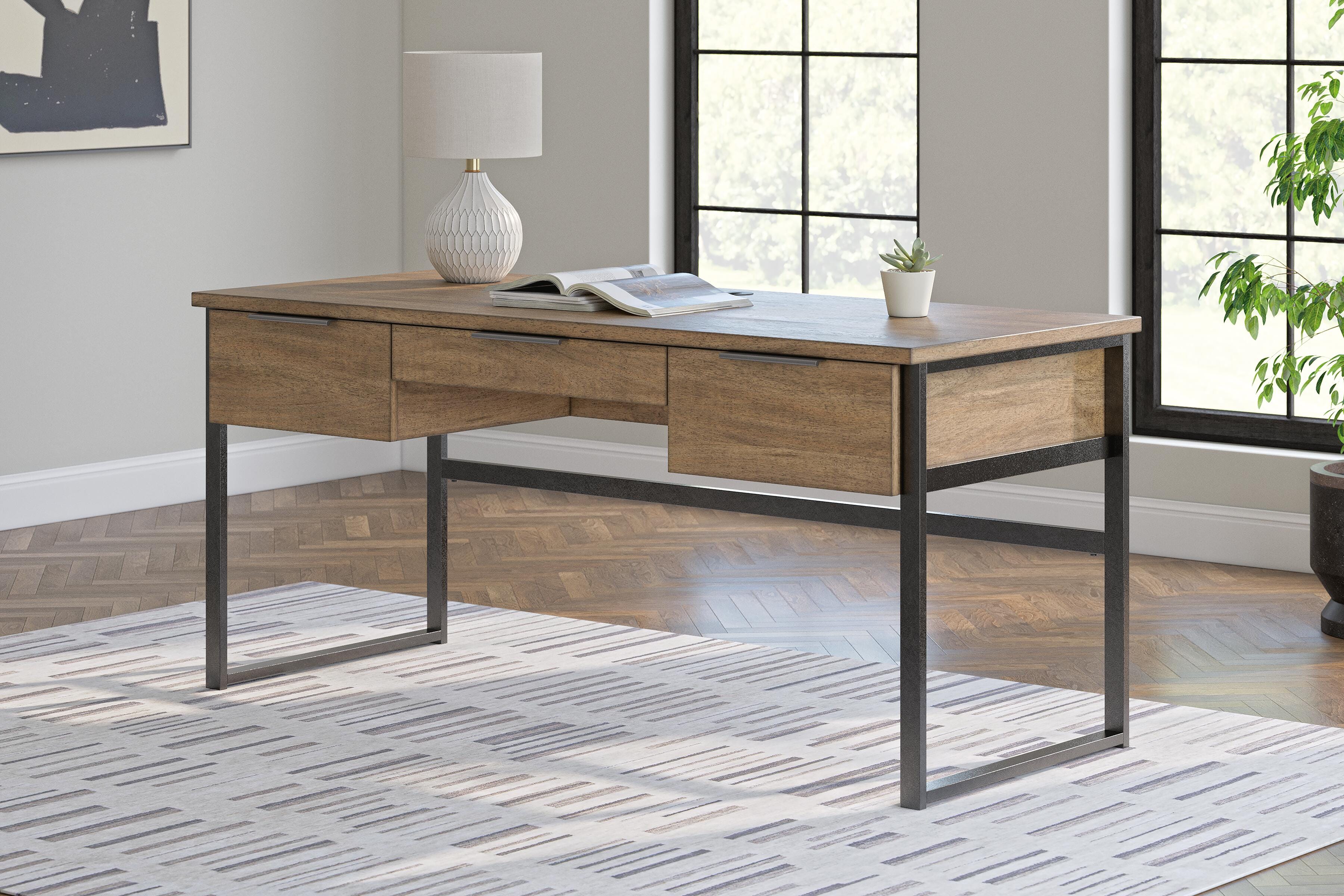 Dar Furniture - Ashley Furniture - Montia 67" Home Office Desk - Home Office Desk / Light Brown - H632-44