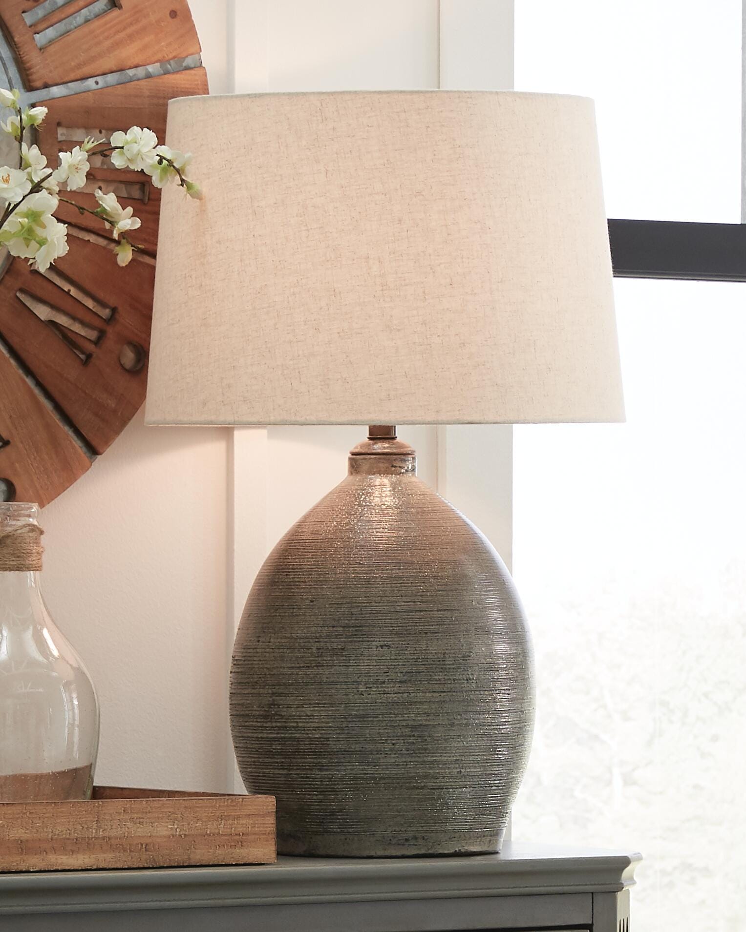 Dar Furniture - Ashley Furniture - Joyelle Table Lamp - Terracotta Table Lamp (1/CN) / Gray - L100744