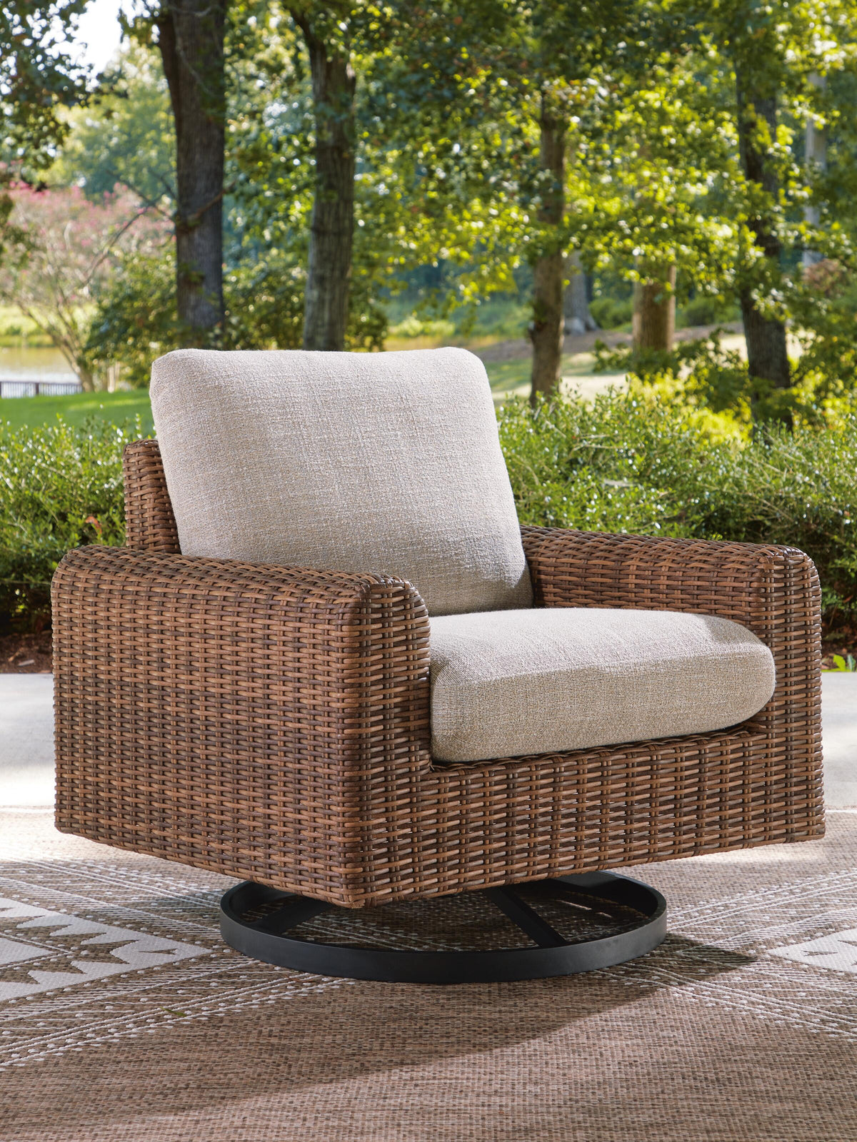Dar Furniture - Ashley Furniture - Dolan Creek Outdoor Swivel Lounge Chair with Cushion - Swivel Lounge w/ Cushion / Gray/Brown - PCP610-821