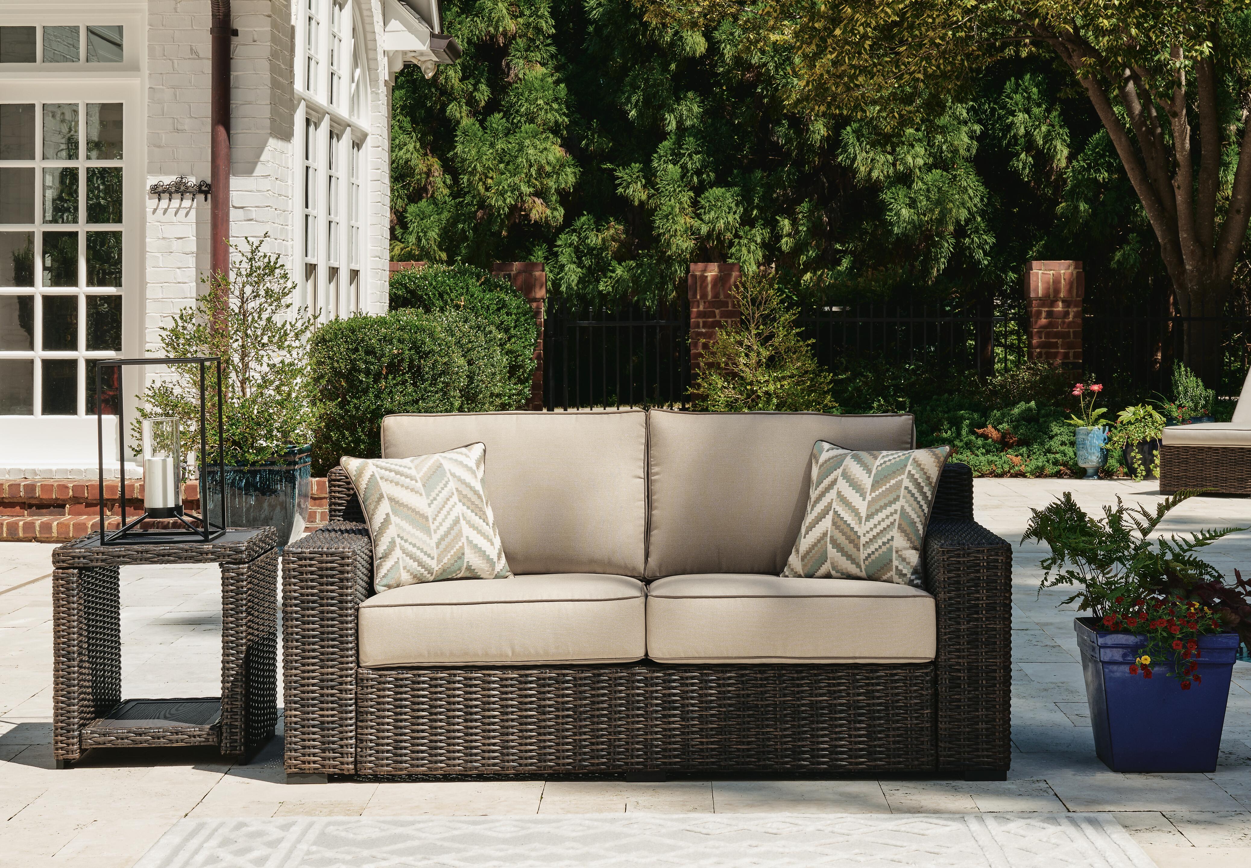Dar Furniture - Ashley Furniture - Coastline Bay Outdoor Loveseat with Cushion - Loveseat w/Cushion / Brown - P784-835