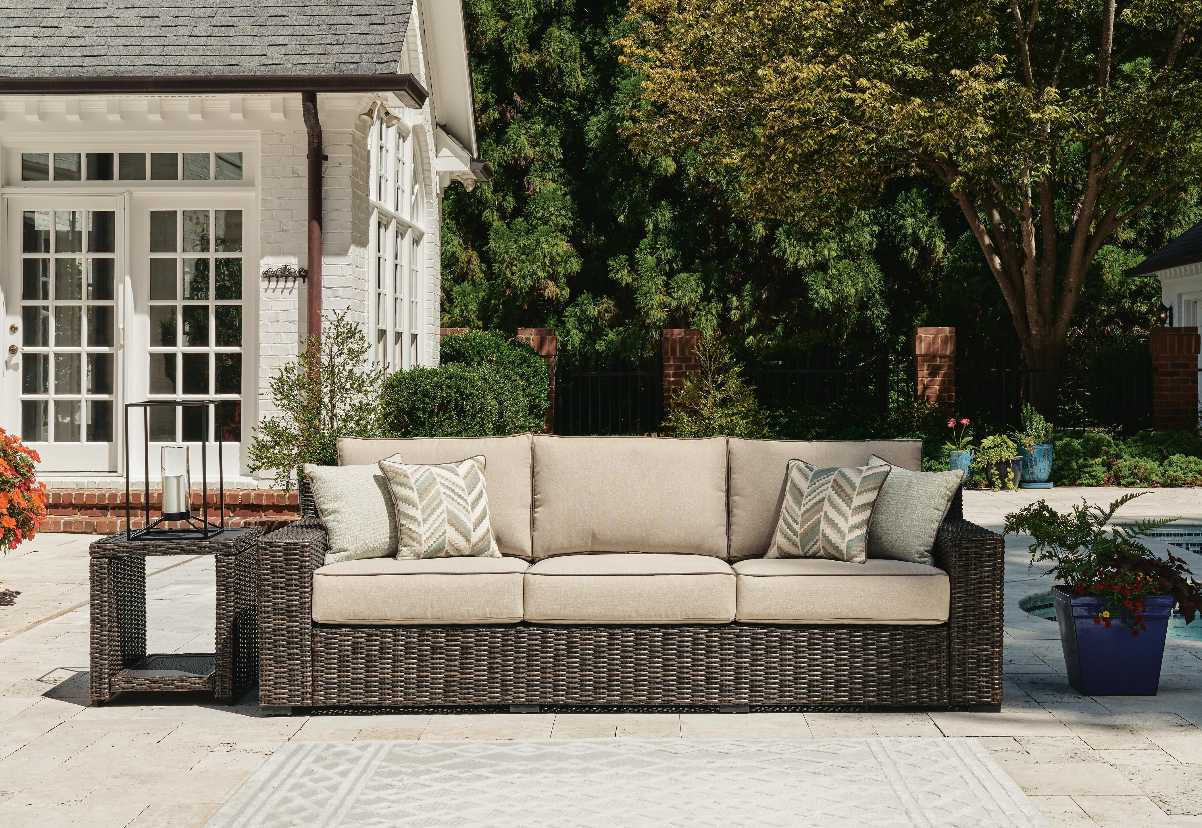 Dar Furniture - Ashley Furniture - Coastline Bay Outdoor Sofa with Cushion - Sofa with Cushion / Brown - P784-838