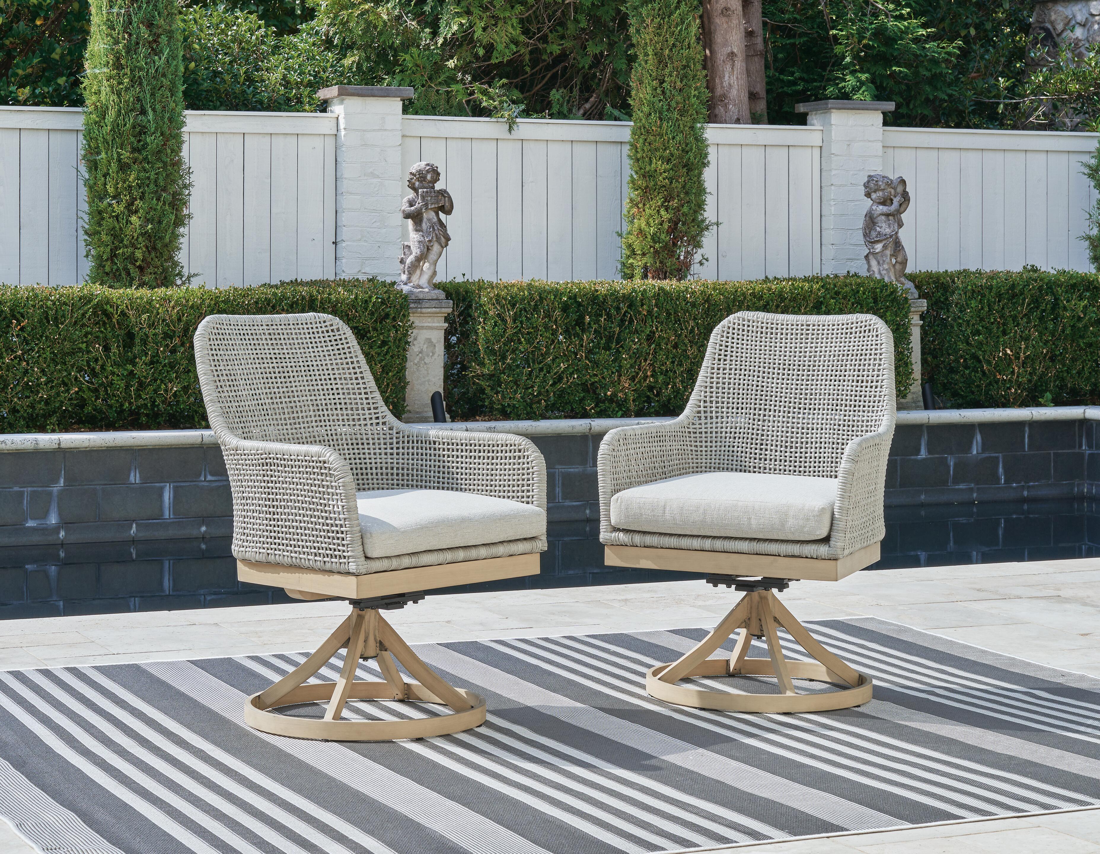 Dar Furniture - Ashley Furniture - Seton Creek Outdoor Swivel Dining Chair (Set of 2) - Swivel Chair w/Cushion (Set of 2) / Gray - P798-602A