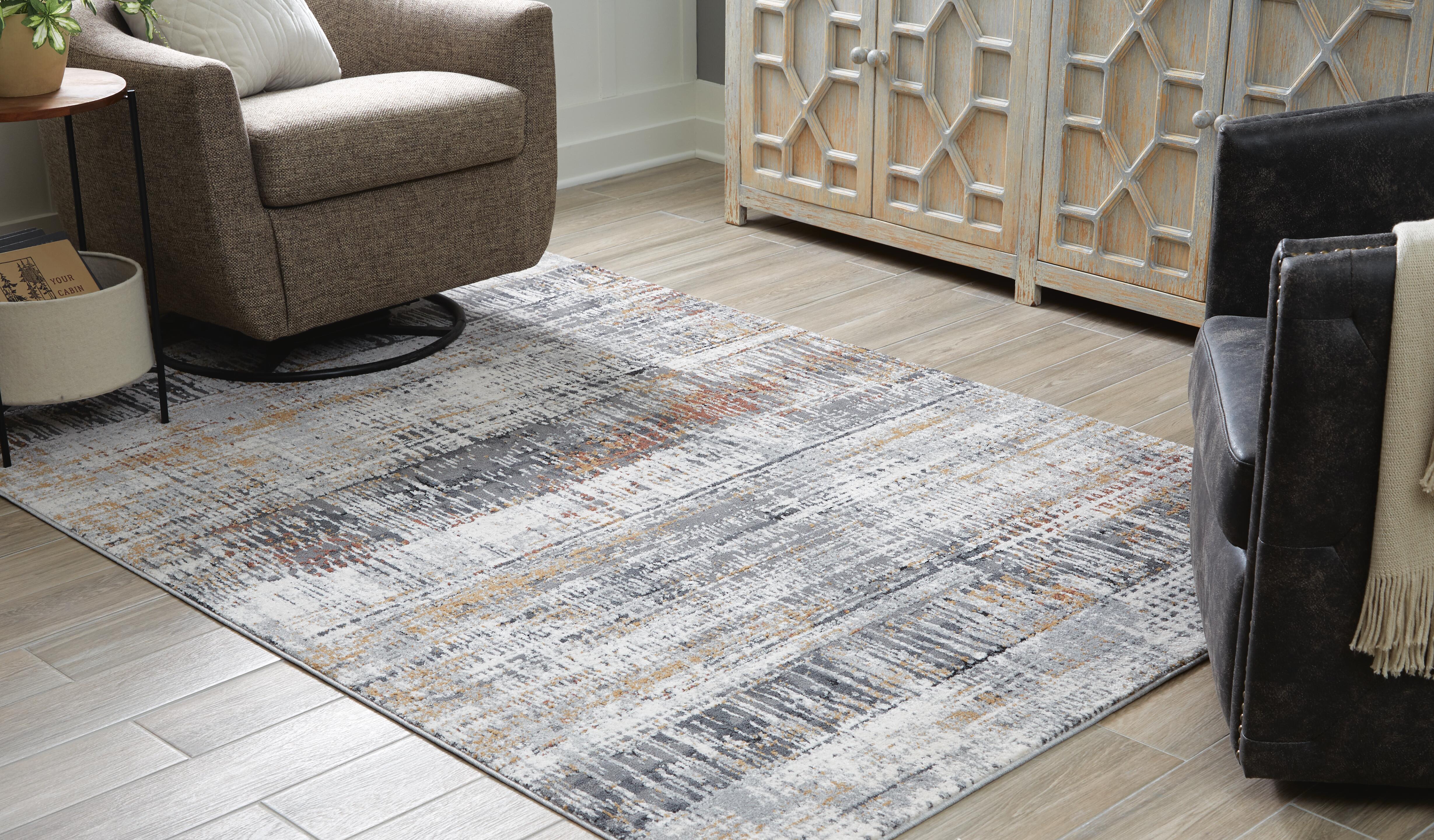 Dar Furniture - Ashley Furniture - Rhettner 5'3" x 7'3" Rug - 5'3" x 7'3" Rug / Multi - R406072
