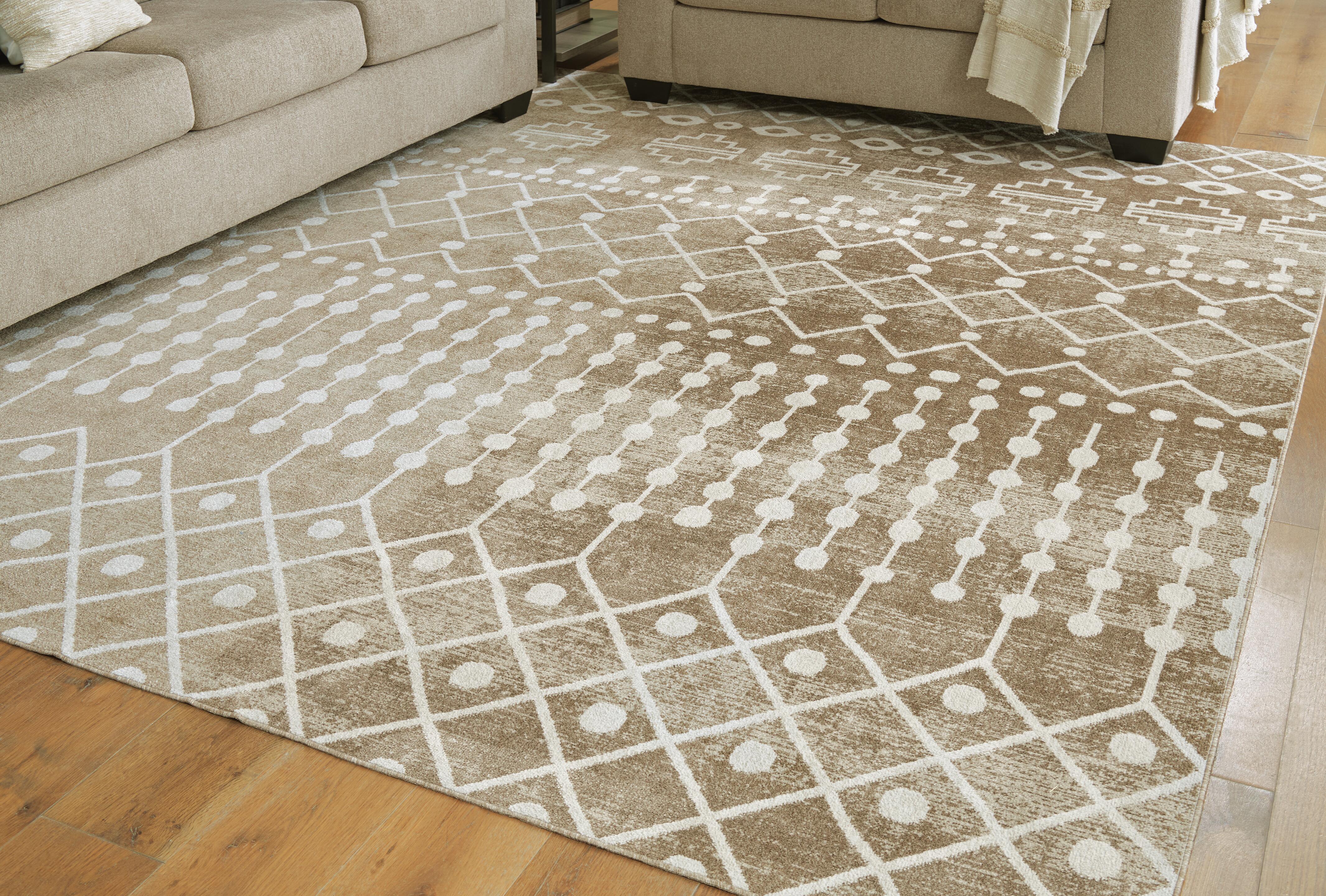 Dar Furniture - Ashley Furniture - Bunchly 7'10" x 10'3" Washable Rug - 7'10" x 10'3" Washable Rug / Tan/Brown/Cream - R406221