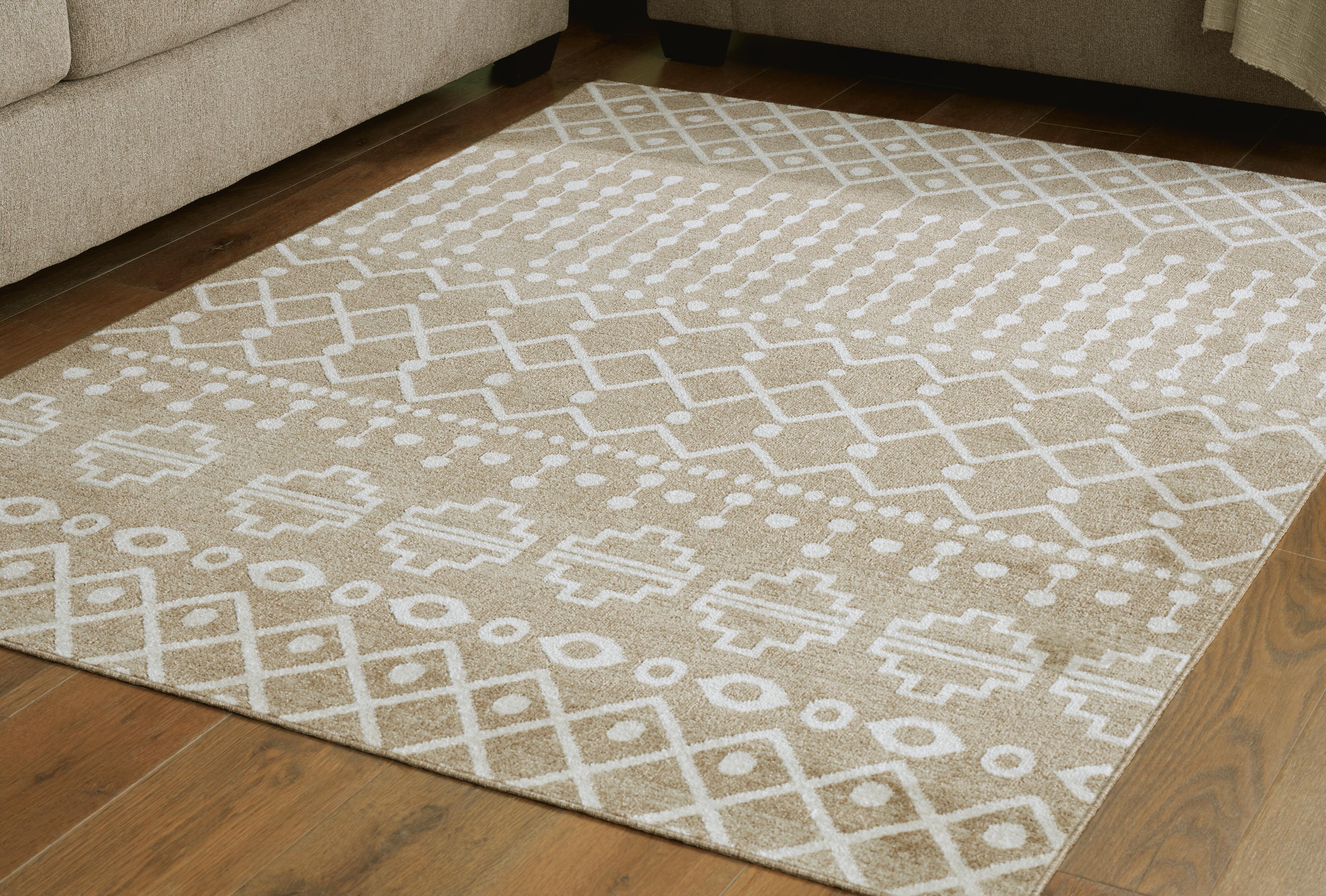 Dar Furniture - Ashley Furniture - Bunchly 4'11" x 7'2" Washable Rug - 4'11" x 7'2" Washable Rug / Tan/Brown/Cream - R406222