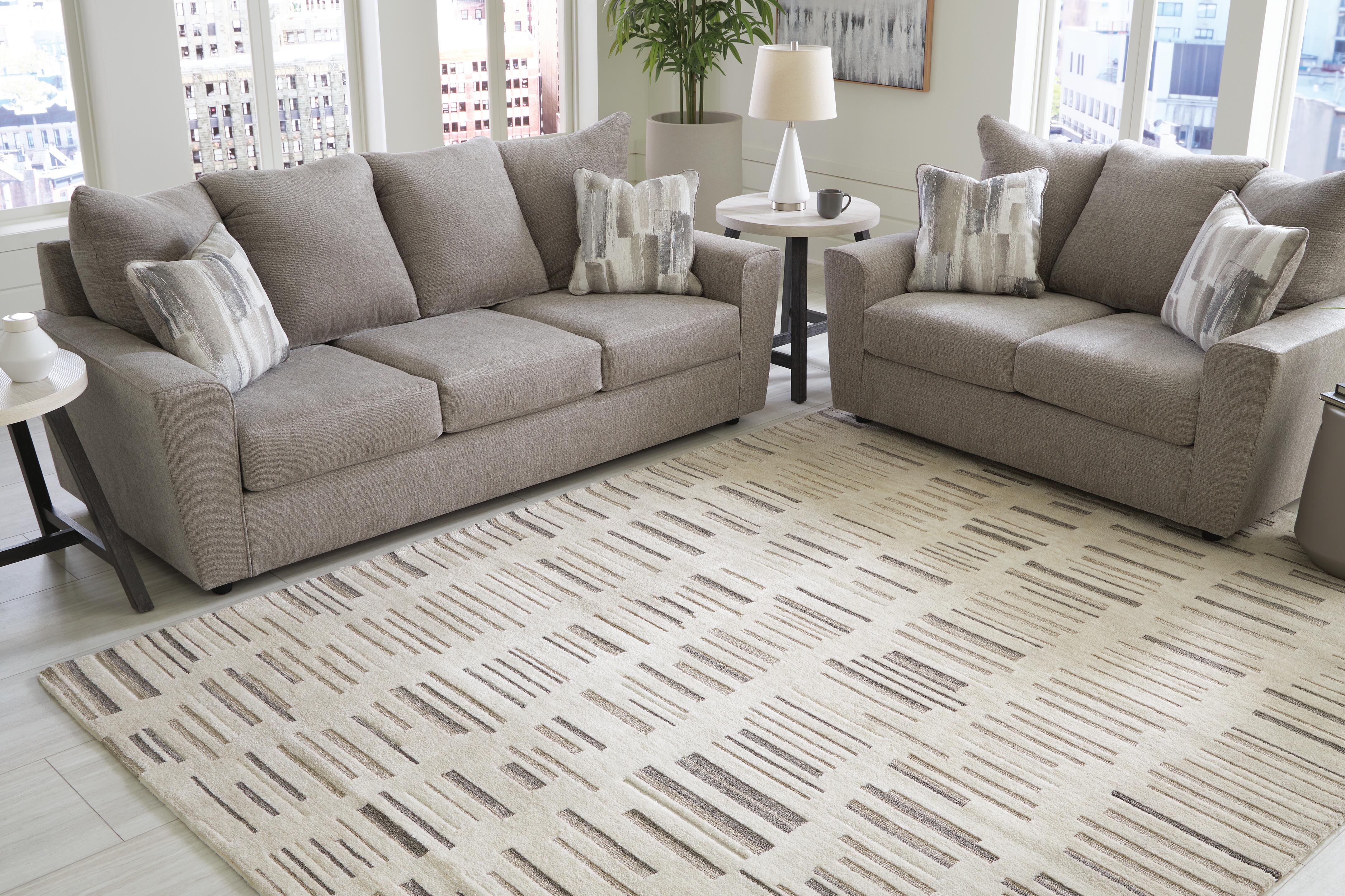 Dar Furniture - Ashley Furniture - Leesdale 8' x 10' Rug - 8' x 10' Rug / Ivory/Brown/Black - R406421