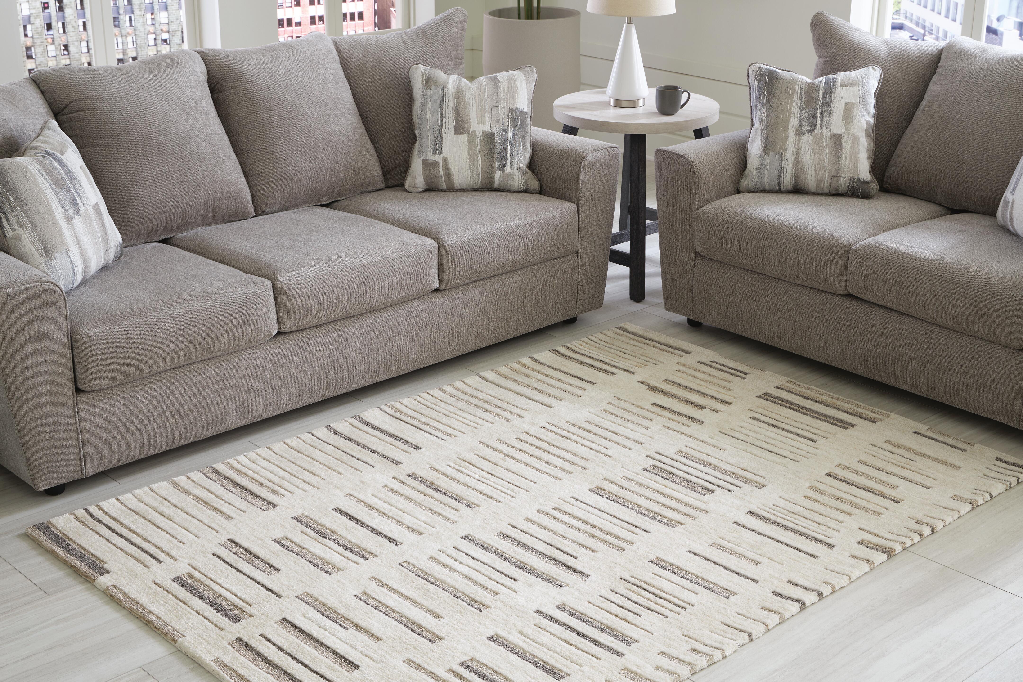 Dar Furniture - Ashley Furniture - Leesdale 5' x 7' Rug - 5' x 7' Rug / Ivory/Brown/Black - R406422