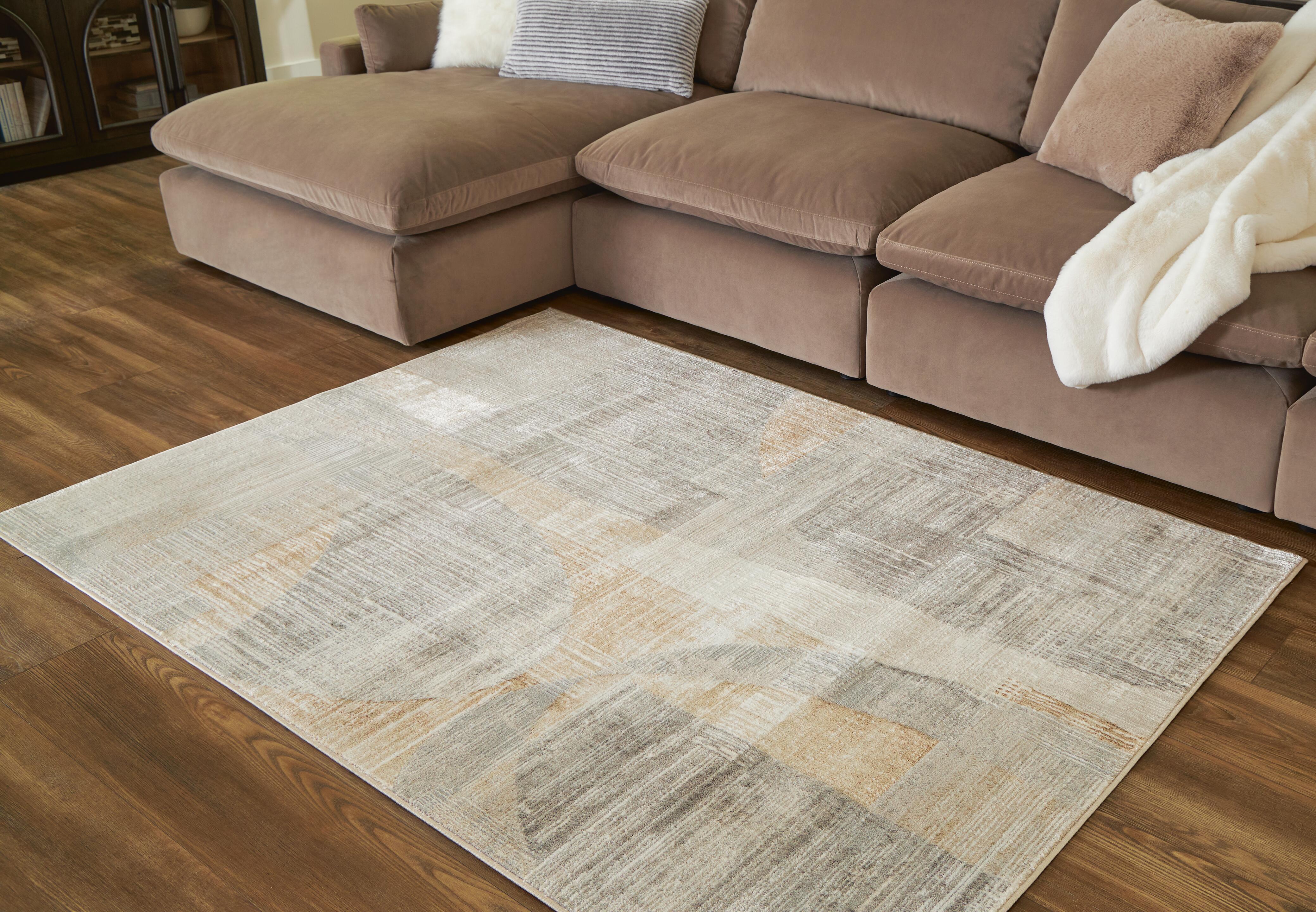 Dar Furniture - Ashley Furniture - Truward 5' x 7' Rug - 5' x 7' Rug / Linen/Gray/Caramel - R406472