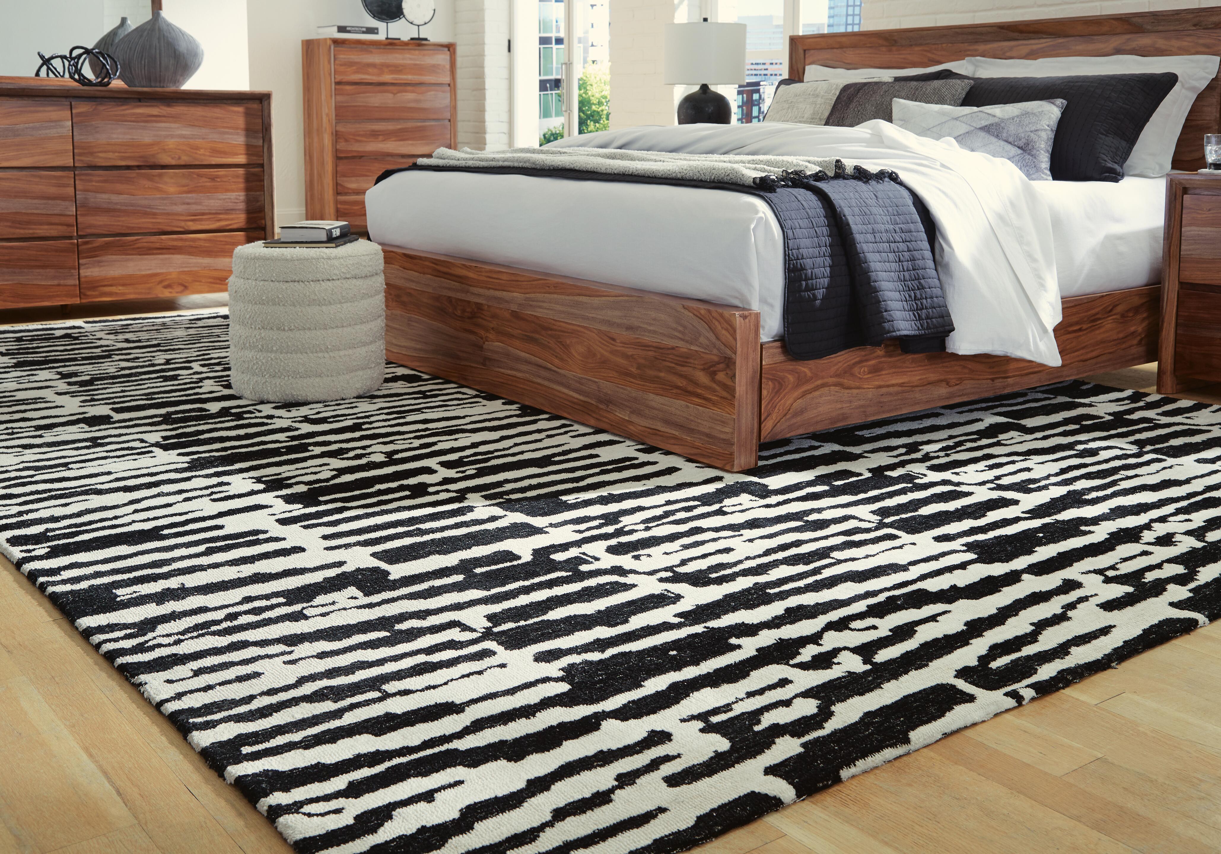 Dar Furniture - Ashley Furniture - Bramshaw 10' x 14' Rug - 10' x 14' Rug / Black/Ivory - R406760