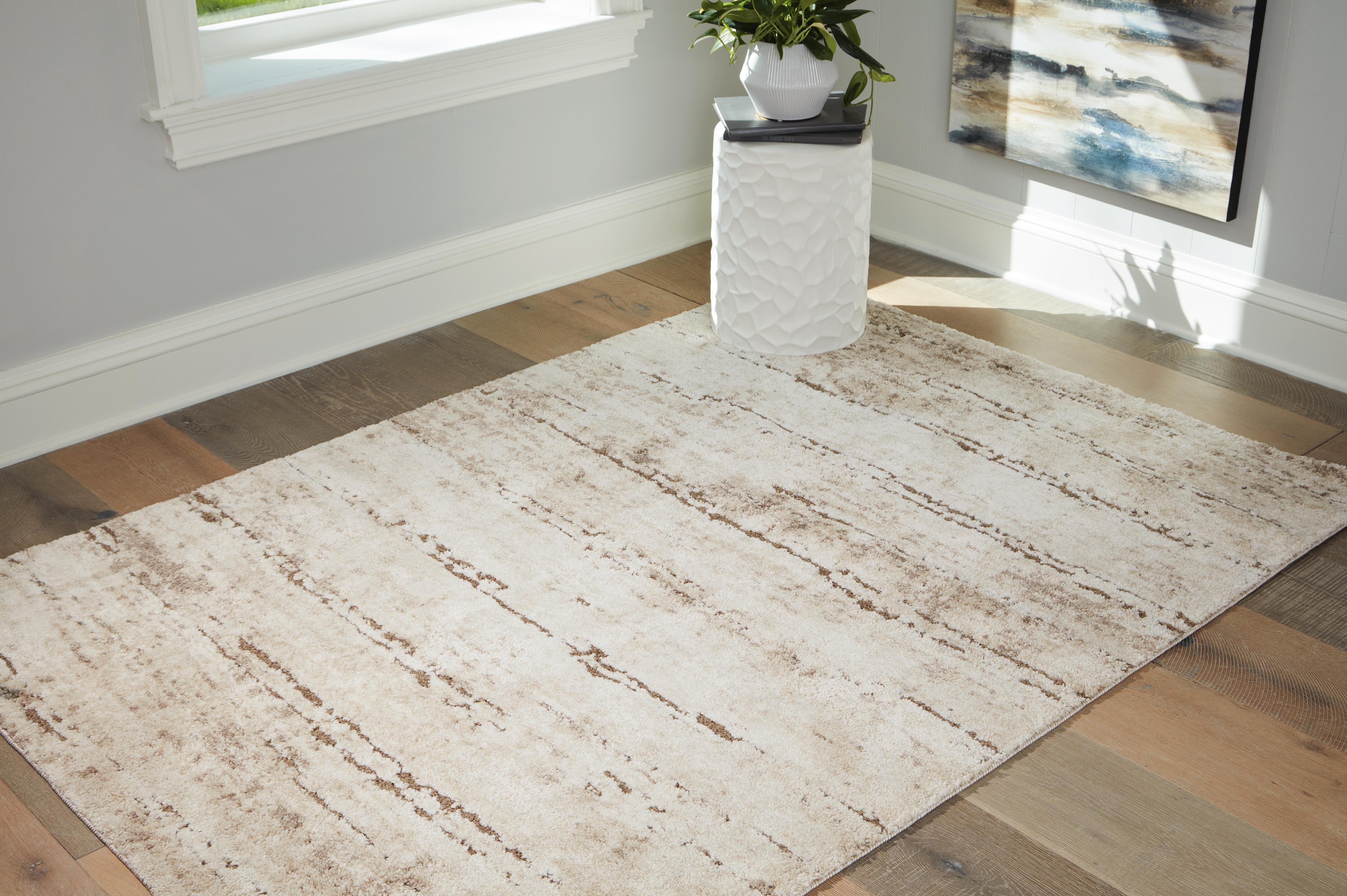 Dar Furniture - Ashley Furniture - Kasney 5' x 7' Rug - 5' x 7' Rug / Cream/Brown - R406852
