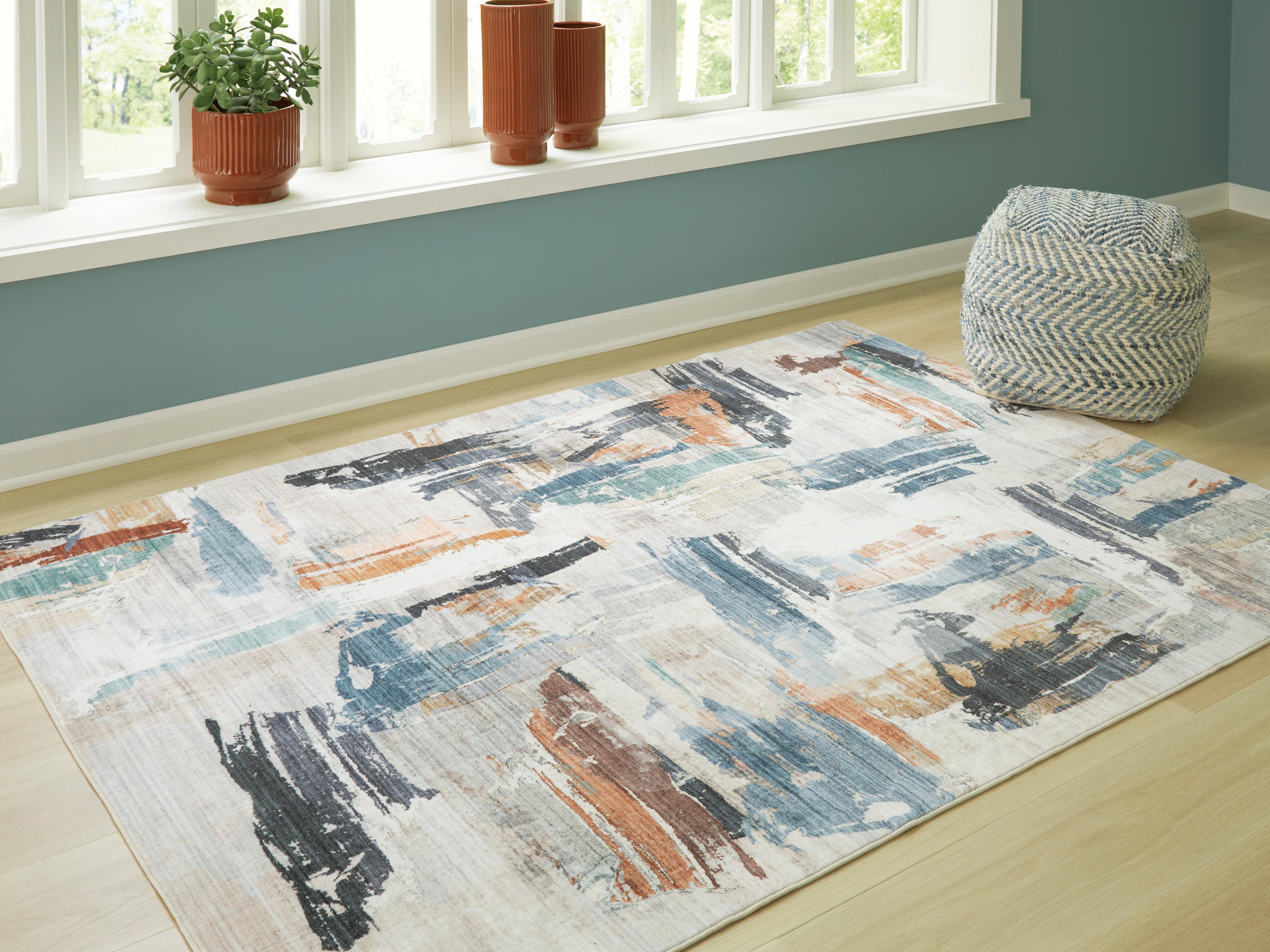 Dar Furniture - Ashley Furniture - Hessland 5' x 7' Washable Rug - 5' x 7' Washable Rug / Multi - R407052