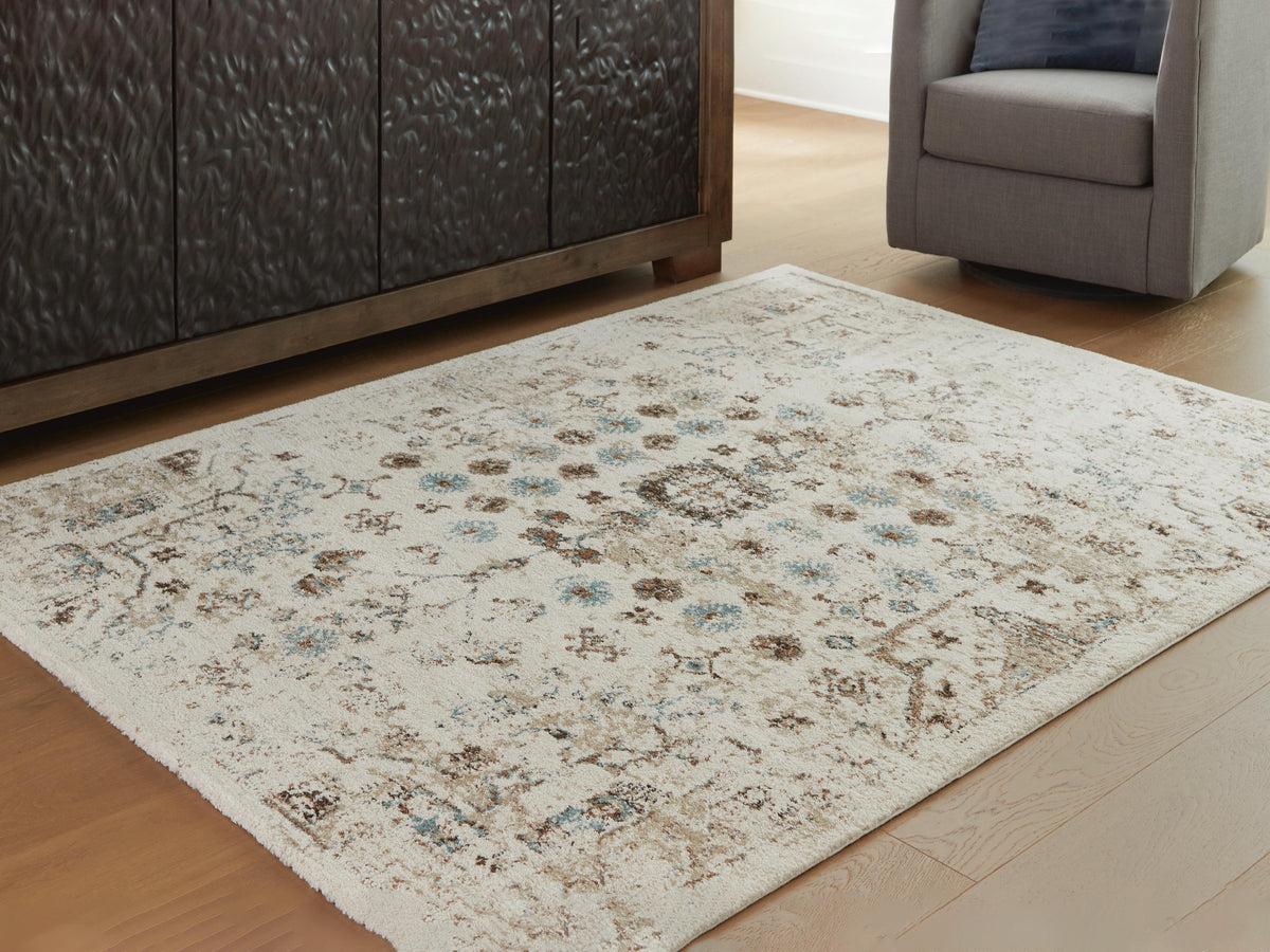 Dar Furniture - Ashley Furniture - Jossler 5' x 7' Rug - 5' x 7' Rug / Ivory/Brown/Teal - R407072