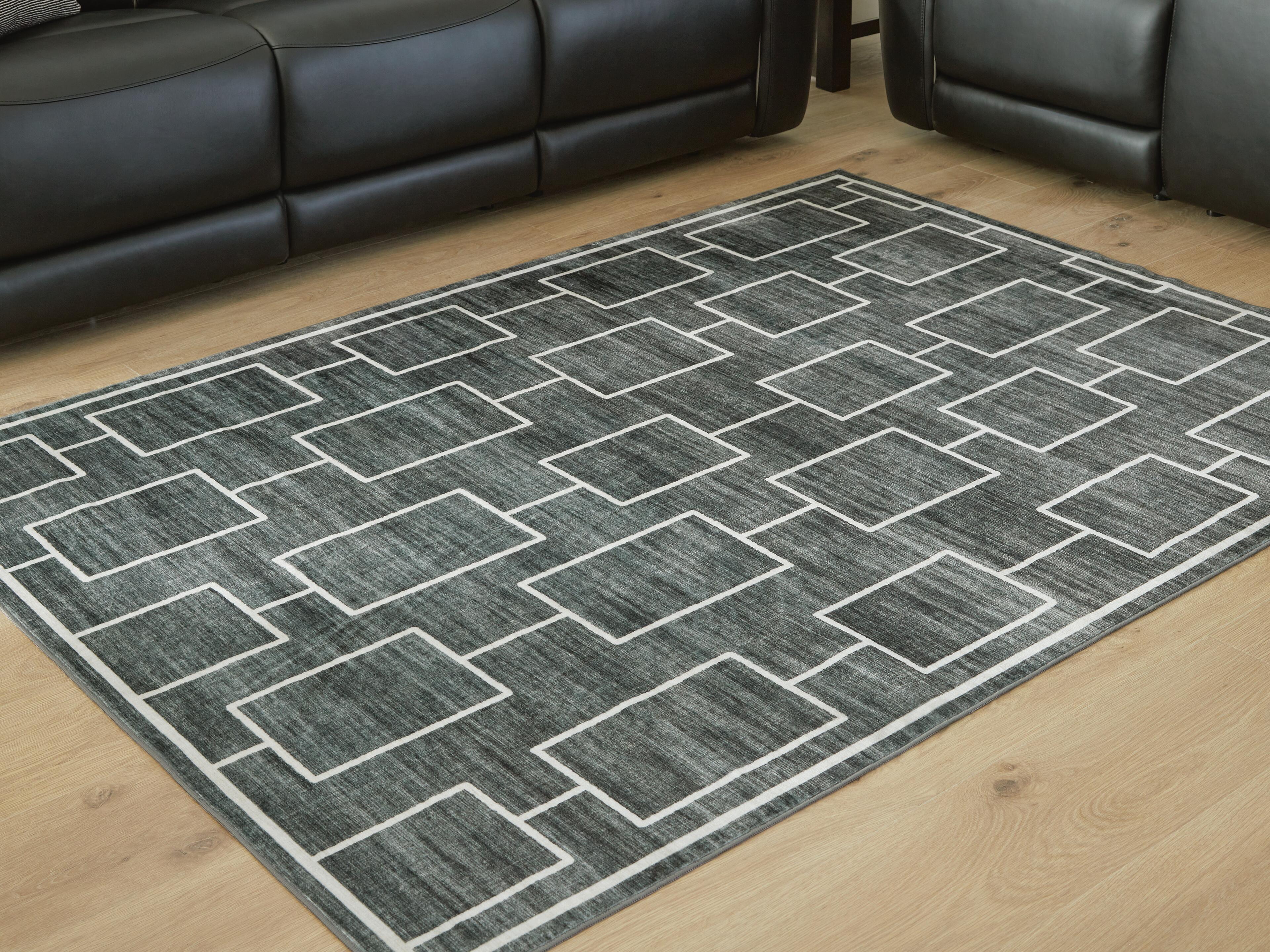 Dar Furniture - Ashley Furniture - Elderland Washable 5' x 7' Area Rug - Washable 5' x 7' Area Rug / Black/Gray - R407402