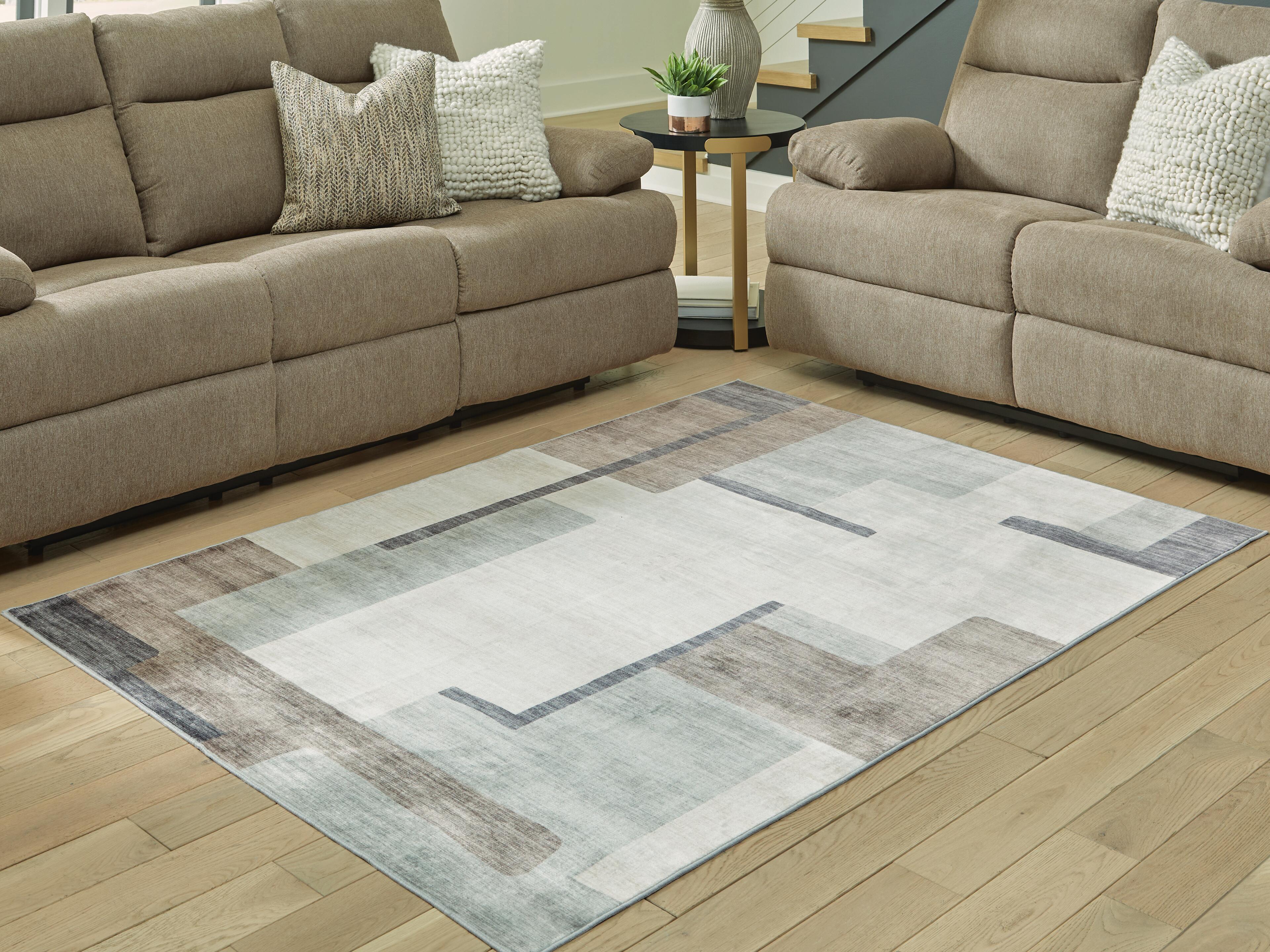 Dar Furniture - Ashley Furniture - Larkport Washable 5' x 7' Area Rug - Washable 5' x 7' Area Rug / Cream/Brown/Gray - R407412