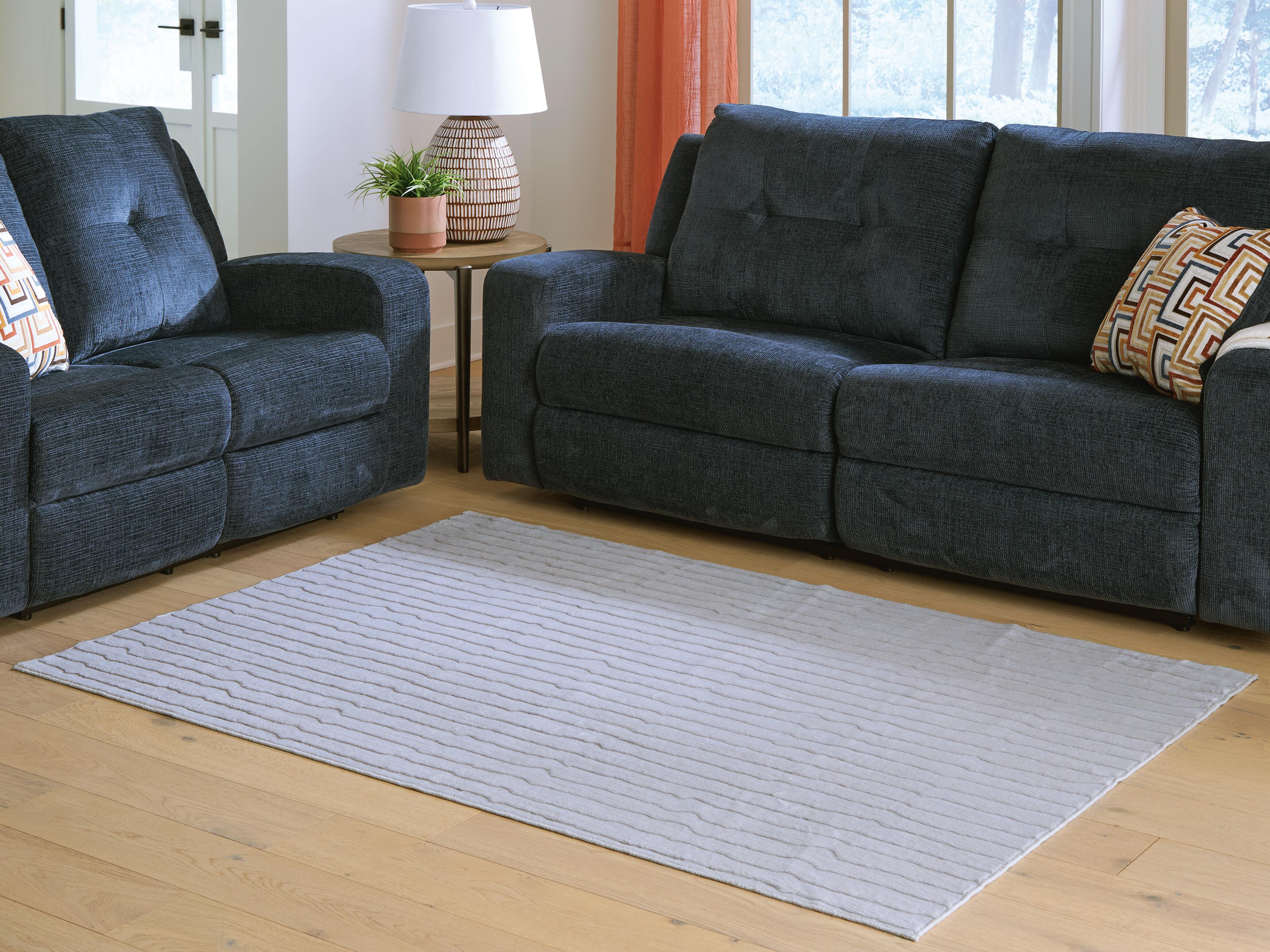 Dar Furniture - Ashley Furniture - Worthley Washable 5' x 7' Area Rug - Washable 5' x 7' Area Rug / Gray - R407452
