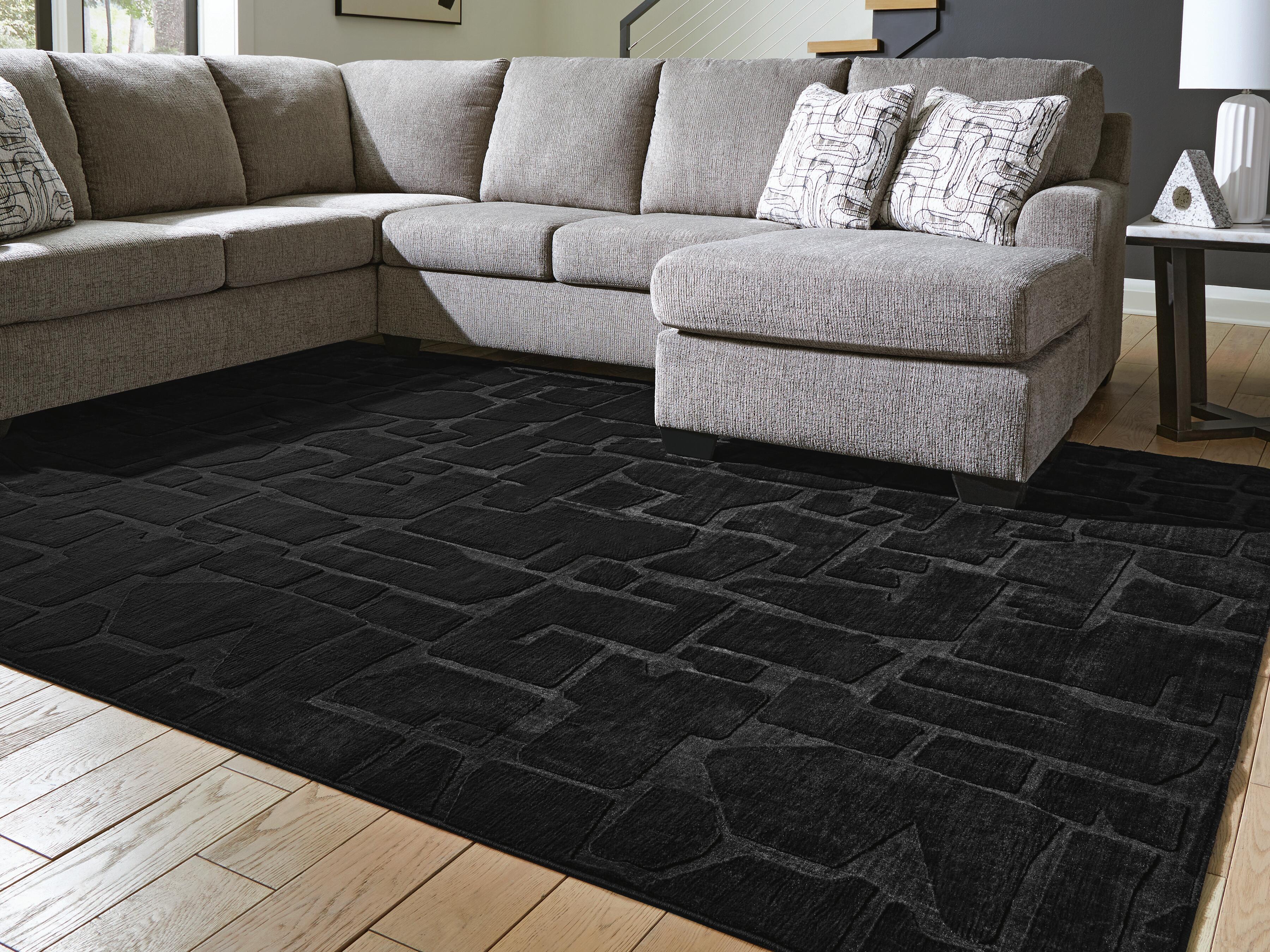 Dar Furniture - Ashley Furniture - Gibbswell Washable 8' x 10' Area Rug - Washable 8' x 10' Area Rug / Black - R407461