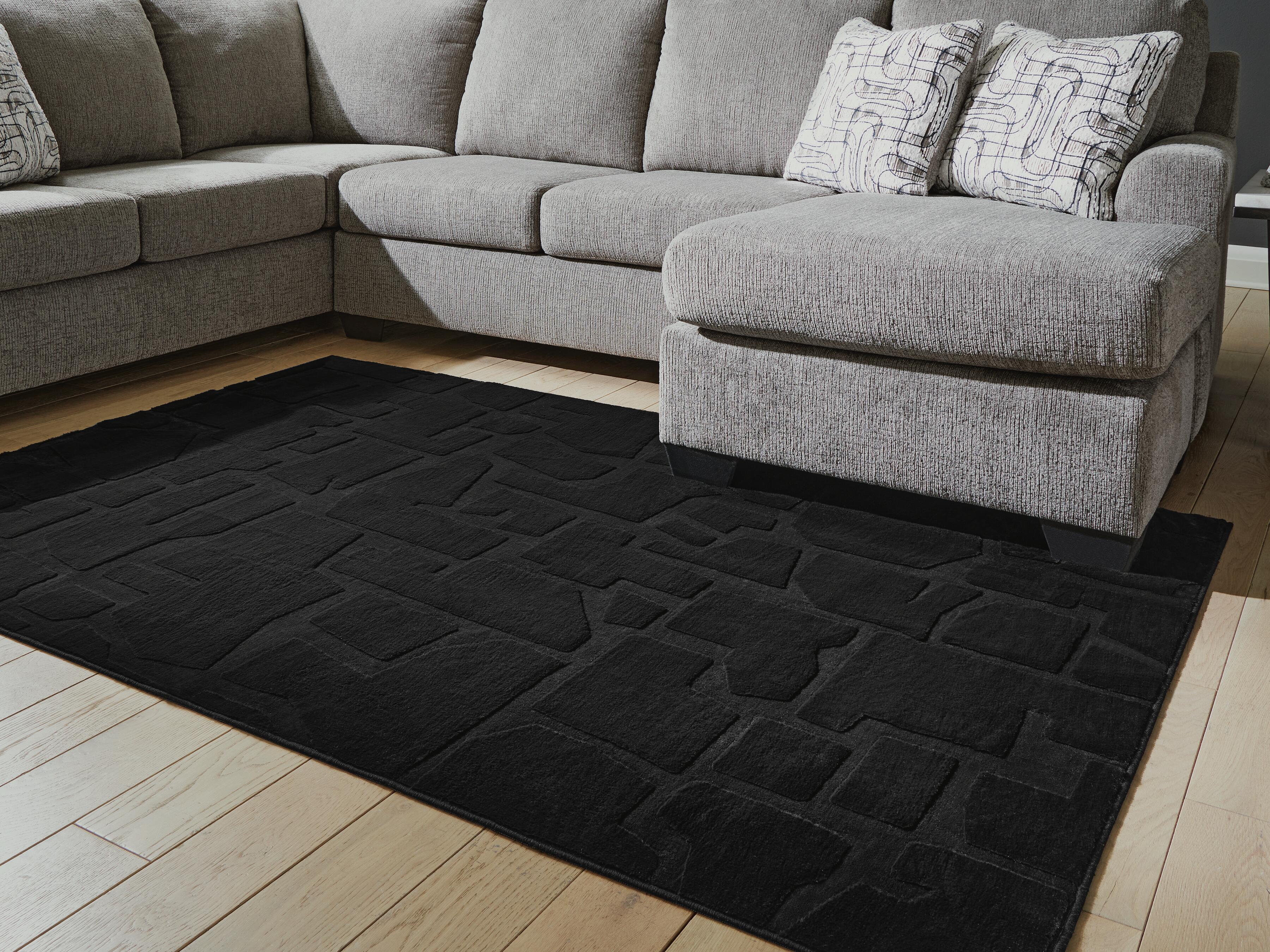 Dar Furniture - Ashley Furniture - Gibbswell Washable 5' x 7' Area Rug - Washable 5' x 7' Area Rug / Black - R407462