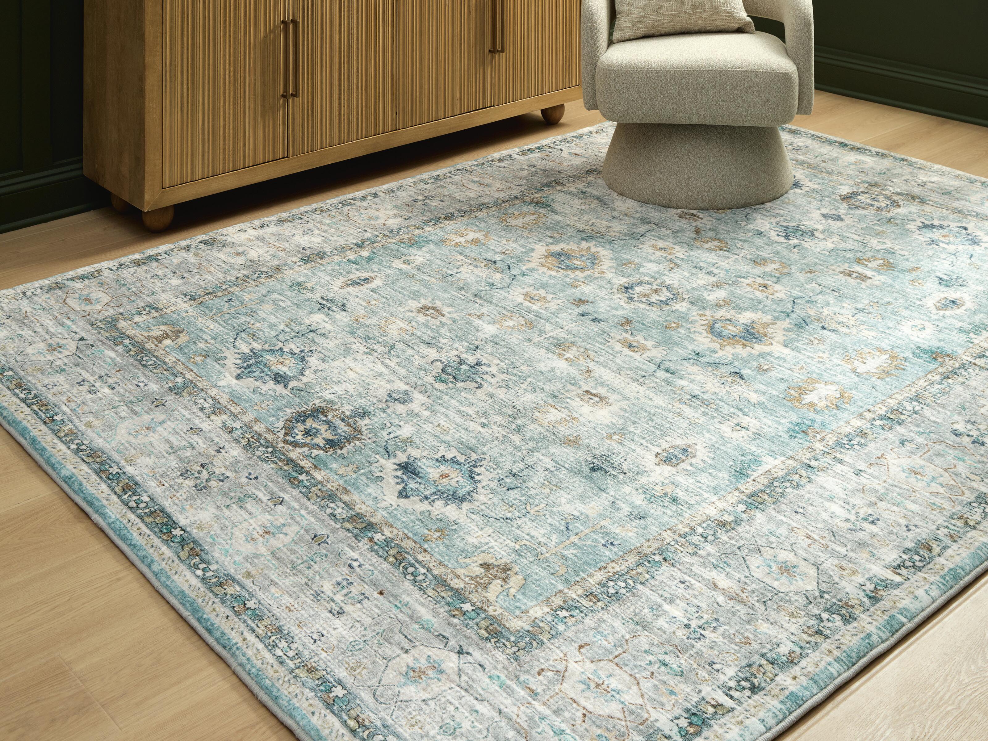 Dar Furniture - Ashley Furniture - Ladstoney 7'6" X 9'6" Memory Foam Area Rug - 7'6" X 9'6" Memory Foam Area Rug / Teal/Beige/Ochre - R407501