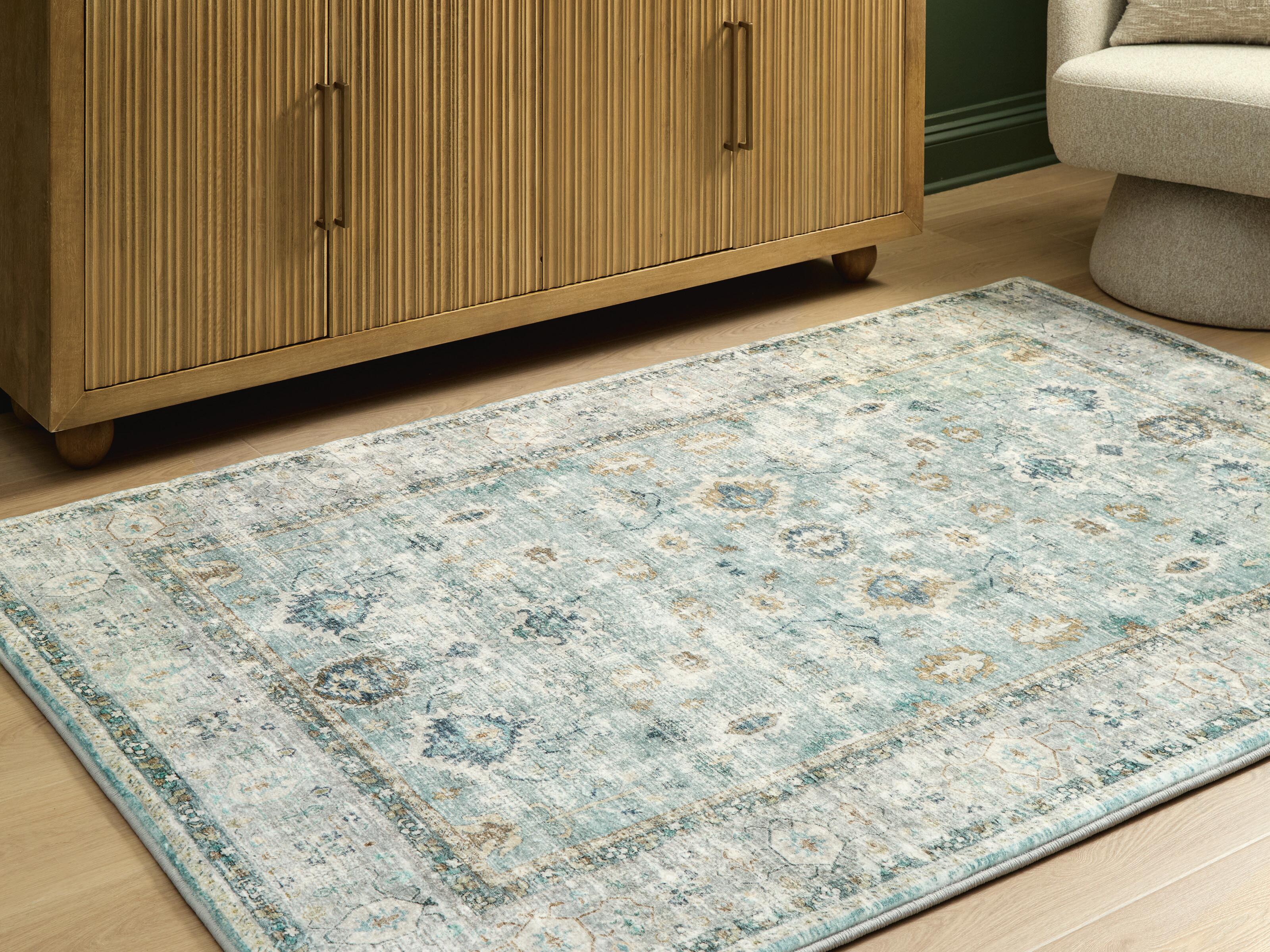 Dar Furniture - Ashley Furniture - Ladstoney 5' x 7' Memory Foam Area Rug - 5' x 7' Memory Foam Area Rug / Teal/Beige/Ochre - R407502