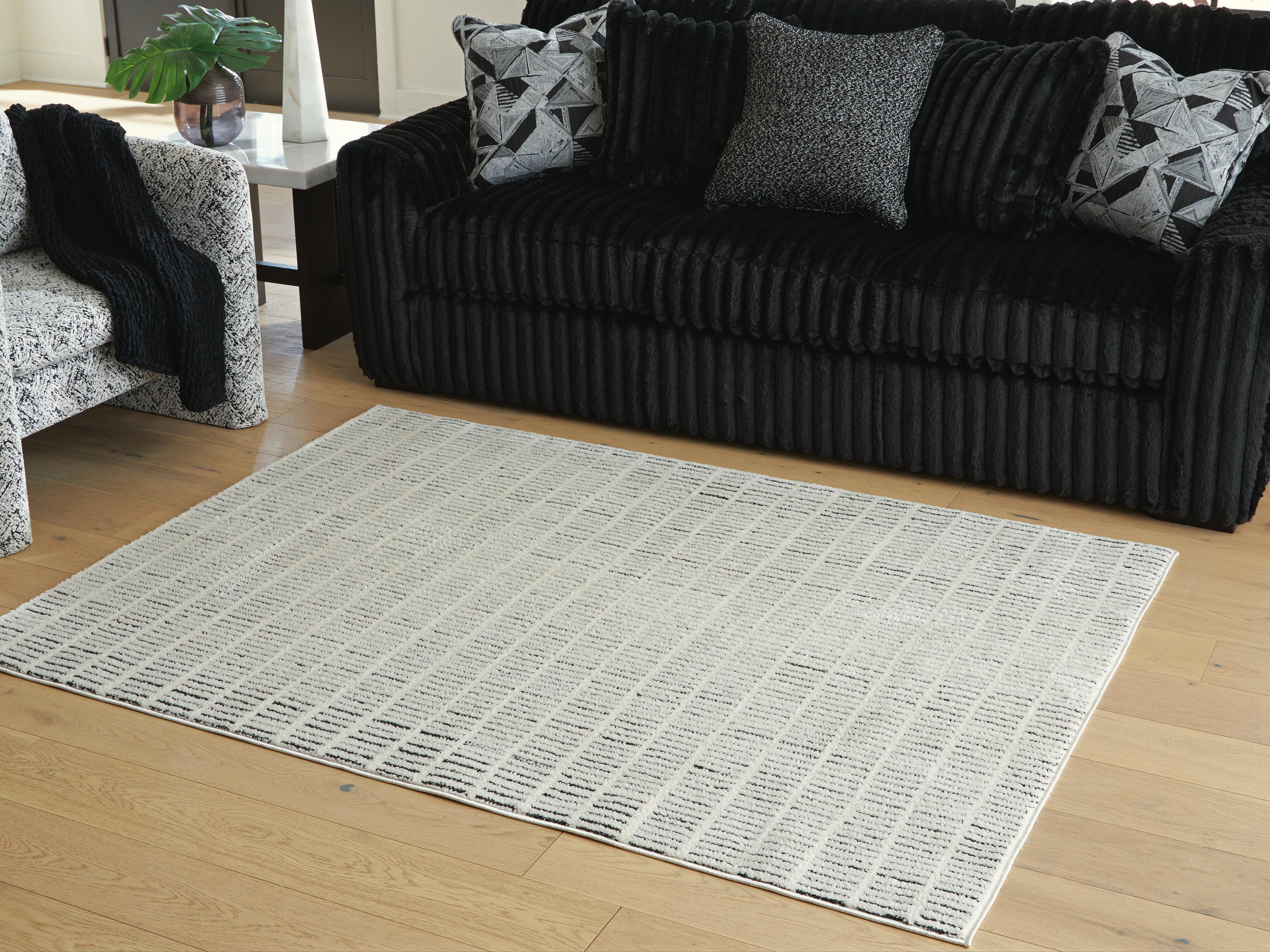 Dar Furniture - Ashley Furniture - Turinwith 5'3" x 7' Area Rug - 5'3" x 7' Area Rug / Ivory/Black - R407552