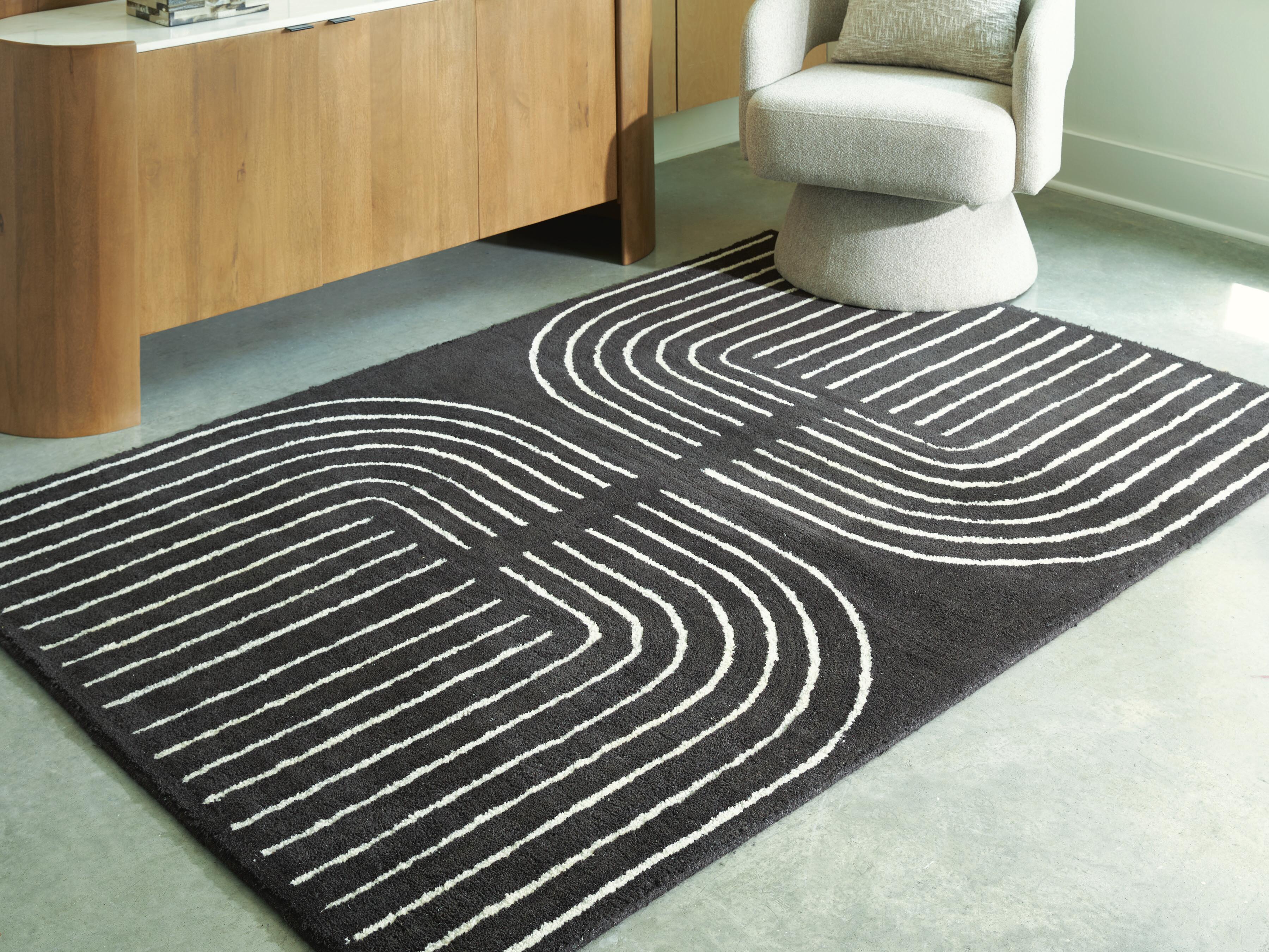 Dar Furniture - Ashley Furniture - Eldonmore 5' x 7' Area Rug - 5' x 7' Area Rug / Black/Ivory - R407572