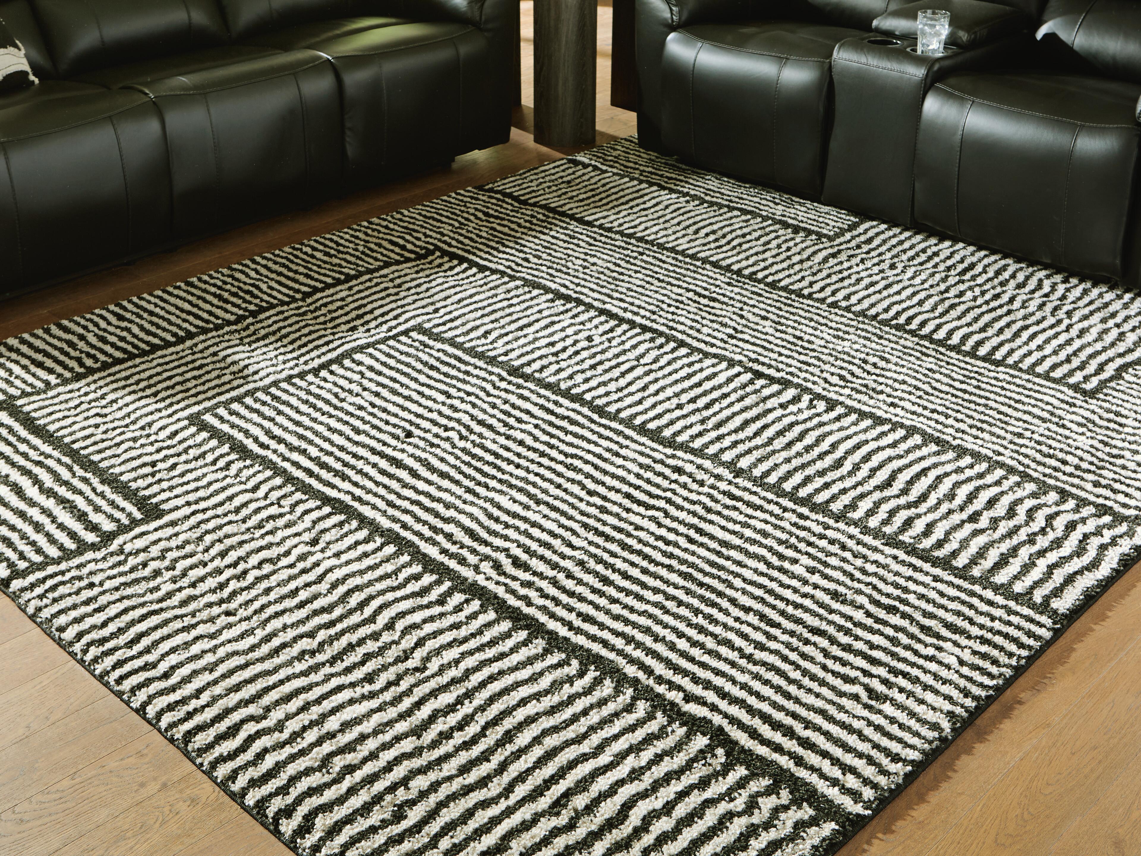 Dar Furniture - Ashley Furniture - Kurtmen 7'10" x 9'10" Area Rug - 7'10" x 9'10" Area Rug / Black/Ivory - R407591