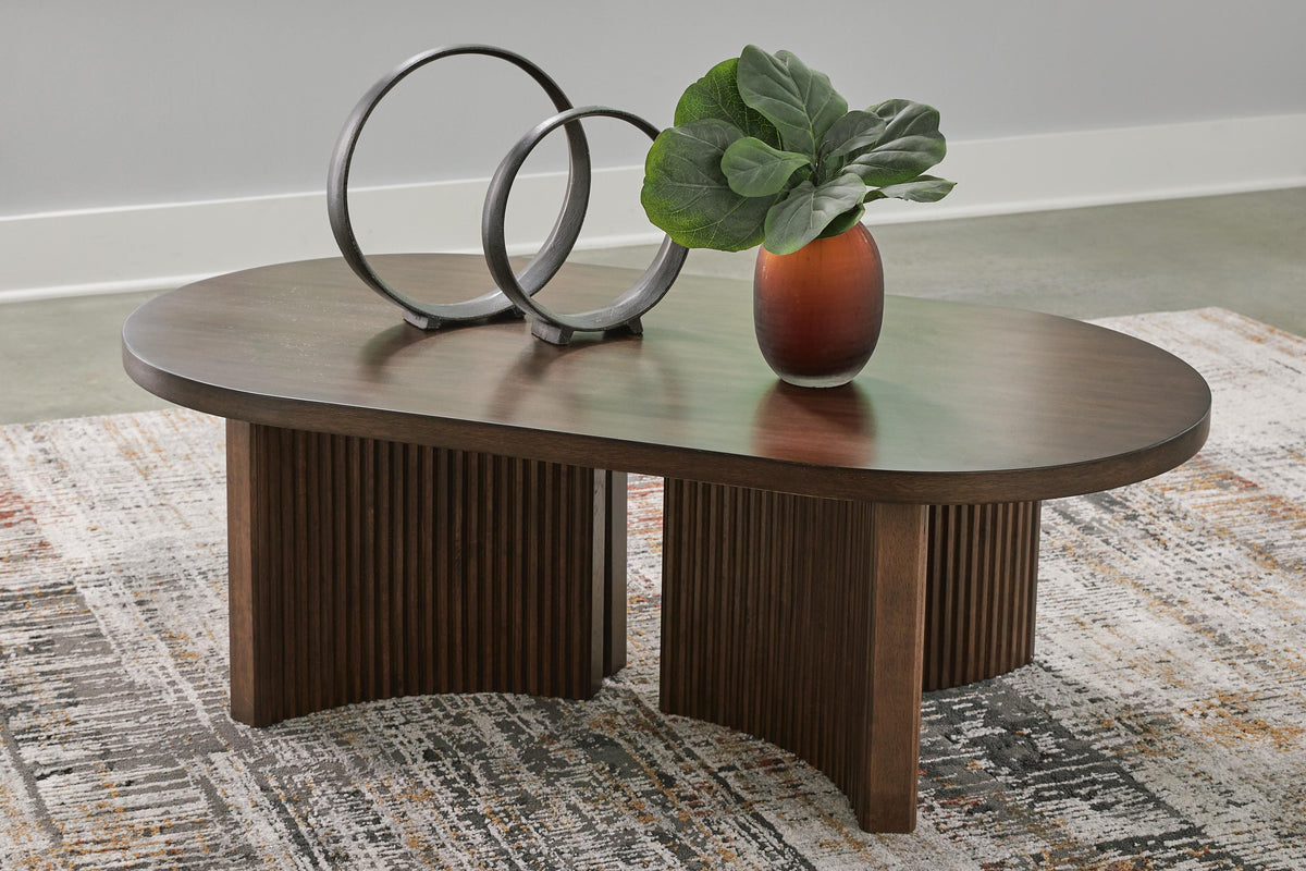 Dar Furniture - Ashley Furniture - Korestone Coffee Table - Oval Cocktail Table / Dark Brown - T689-0